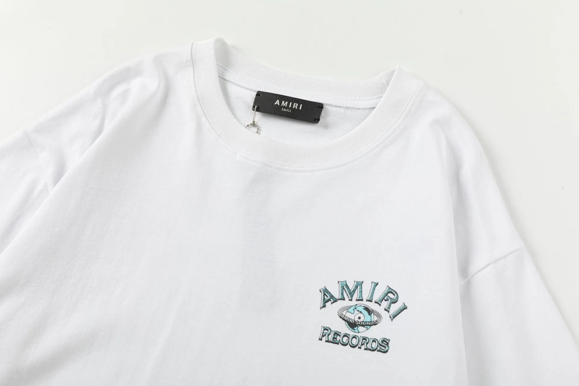 AMlRl Global records T-Shirt