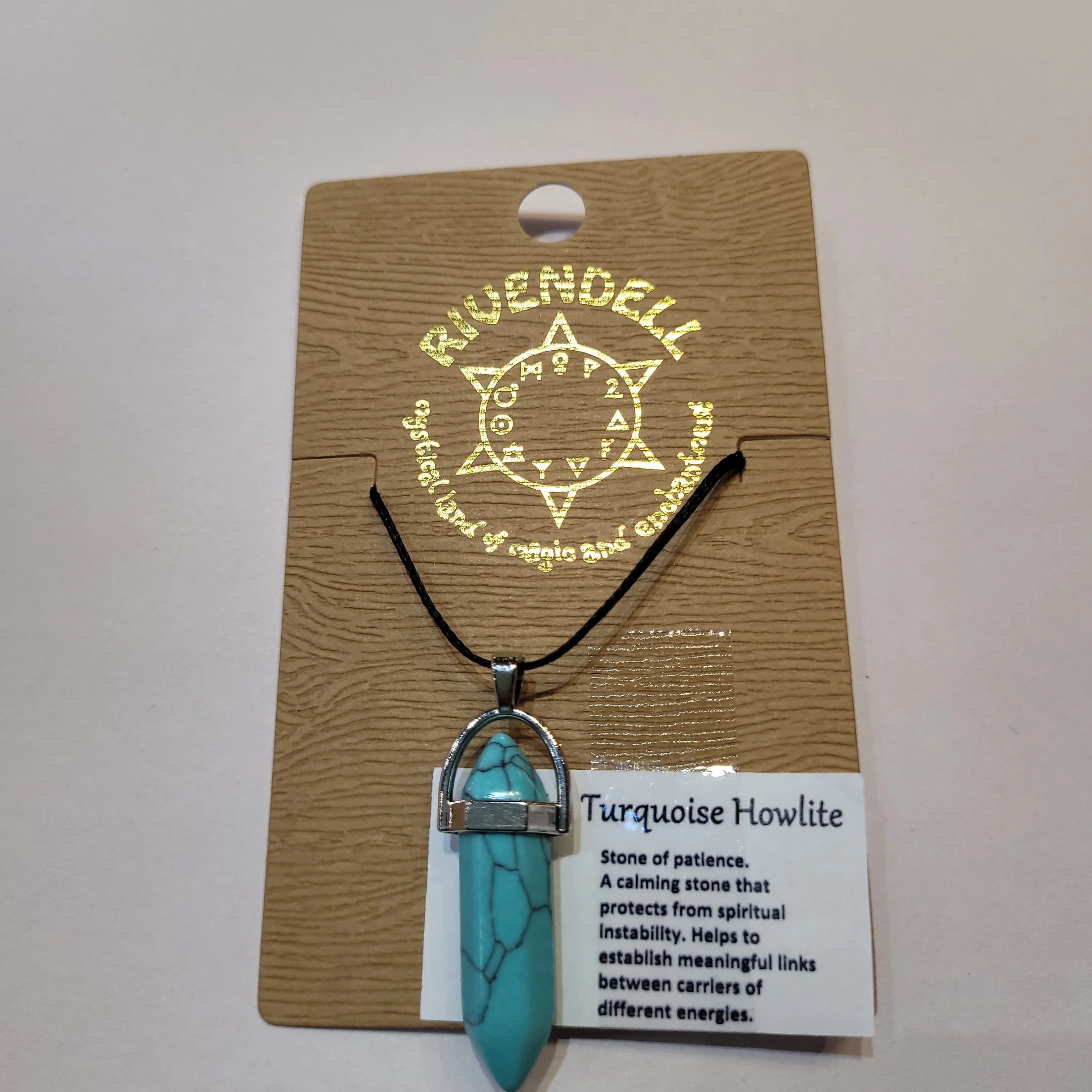 Turquoise Howlite Crystal Point Pendant